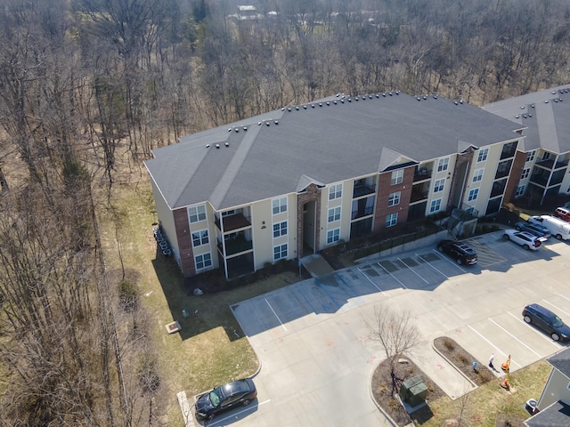 drone / aerial view with a view of trees