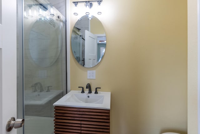 full bathroom with a shower and vanity