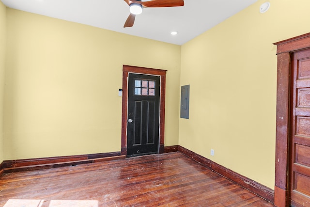 entrance foyer featuring electric panel, dark wood-style floors, baseboards, and ceiling fan