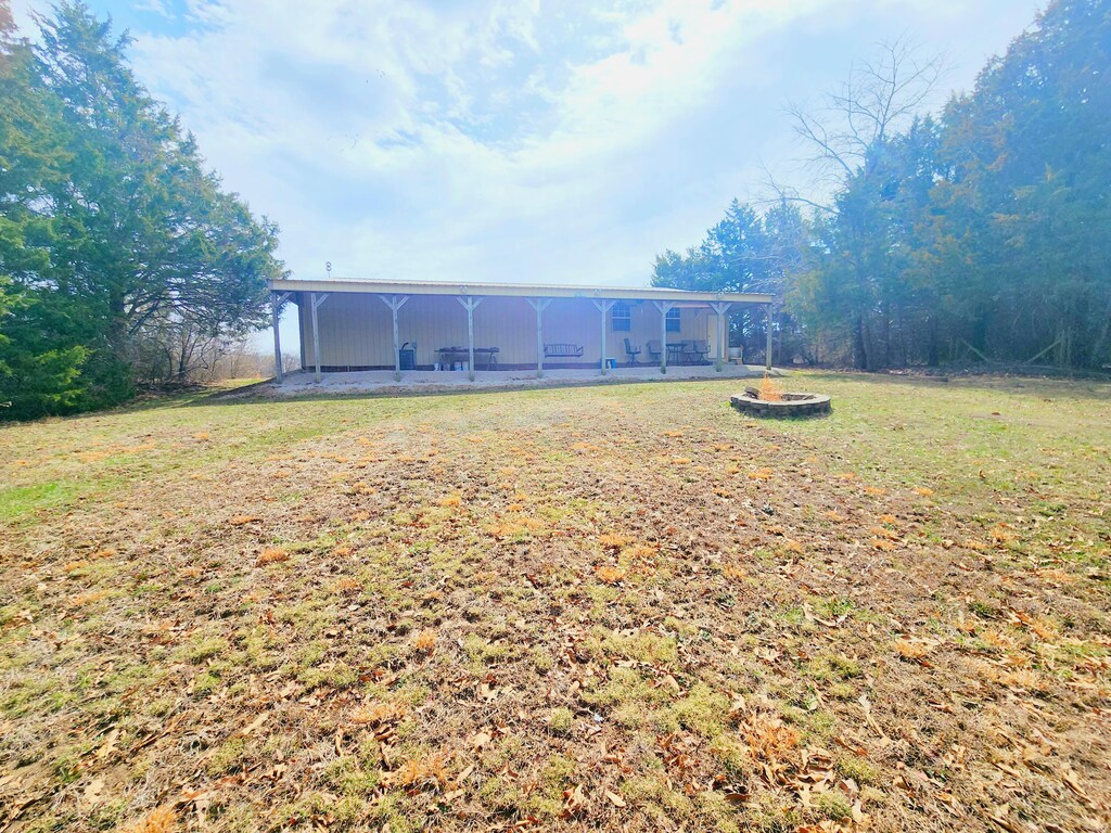 43263 Ely Branch Rd, Perry, MO 63462 - exterior space with an outbuilding, a lawn, and a pole building