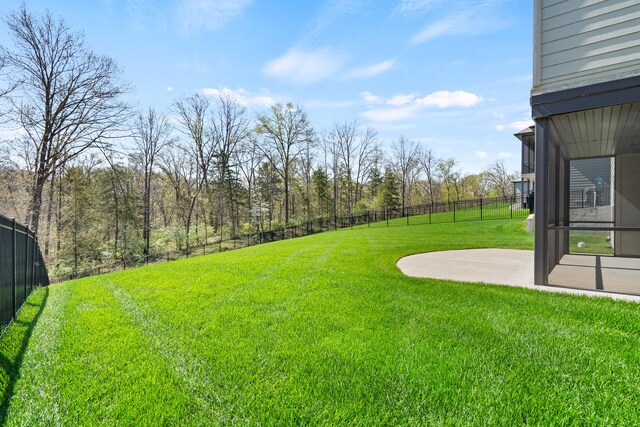 view of yard with a patio and a fenced backyard