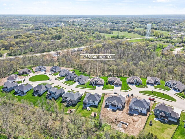 aerial view with a residential view and a forest view