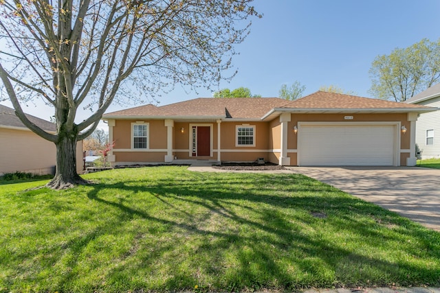 4612 Manhasset Dr, Columbia, MO 65203 - ranch-style house with stucco siding, driveway, a front yard, and a garage