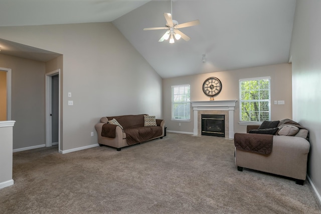 4612 Manhasset Dr, Columbia, MO 65203 - living area featuring high vaulted ceiling, baseboards, a ceiling fan, and a tile fireplace