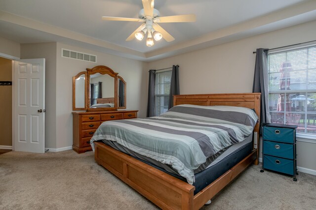 4612 Manhasset Dr, Columbia, MO 65203 - bedroom with baseboards, visible vents, and light colored carpet