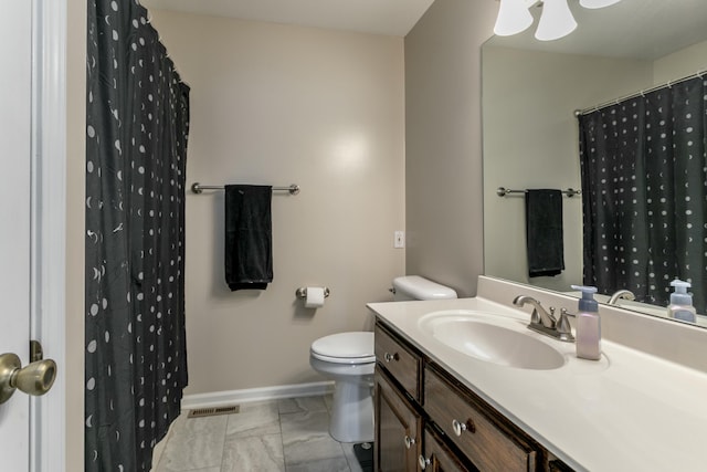 4612 Manhasset Dr, Columbia, MO 65203 - bathroom featuring marble finish floor, visible vents, toilet, vanity, and baseboards