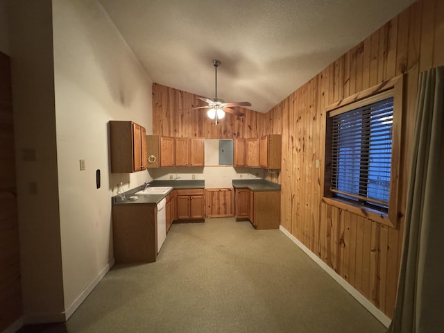 6112 E Forsee Rd, Ashland, MO 65010 - kitchen with lofted ceiling, wood walls, baseboards, a ceiling fan, and dark countertops