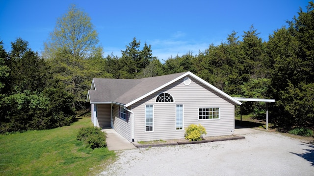 6132 E Forsee Rd, Ashland, MO 65010 - garage with dirt driveway and a wooded view