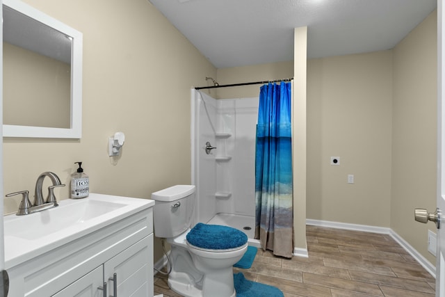 27206 Lakeside Ln, Barnett, MO 65011 - full bath with wood tiled floors, toilet, vanity, and a shower with curtain