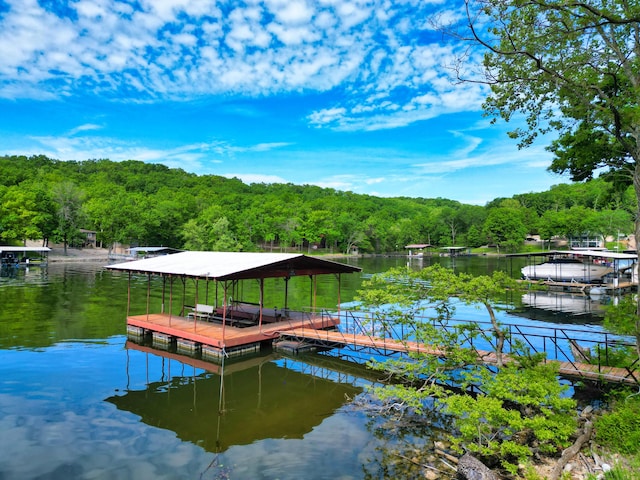 27206 Lakeside Ln, Barnett, MO 65011 - dock area with a view of trees, a water view, and boat lift