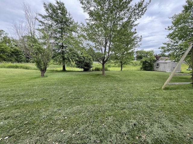 606 Billy Joe Sapp Dr, Ashland, MO 65010 - view of grassy yard with an outbuilding