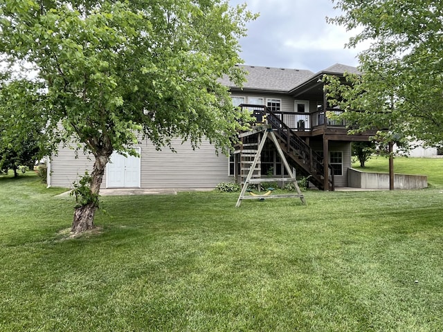 606 Billy Joe Sapp Dr, Ashland, MO 65010 - view of grassy yard featuring a wooden deck and stairs