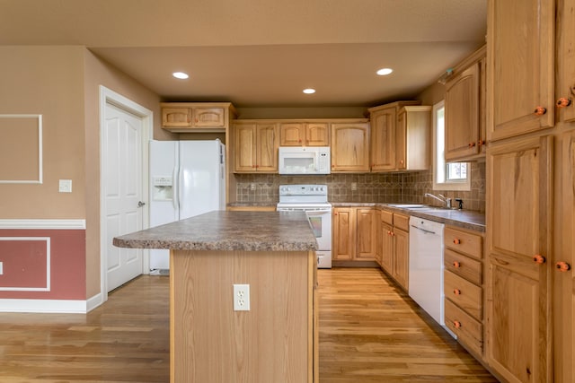 606 Billy Joe Sapp Dr, Ashland, MO 65010 - kitchen with white appliances, light wood finished floors, backsplash, baseboards, and light brown cabinetry