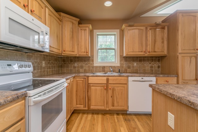 606 Billy Joe Sapp Dr, Ashland, MO 65010 - kitchen featuring white appliances, a sink, light wood finished floors, tasteful backsplash, and recessed lighting