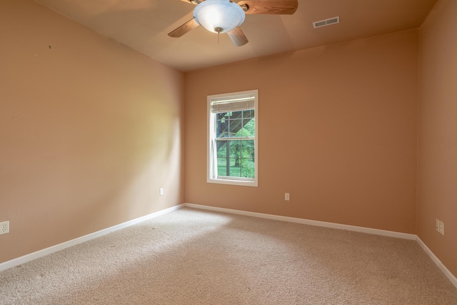 606 Billy Joe Sapp Dr, Ashland, MO 65010 - empty room with light carpet, a ceiling fan, and baseboards