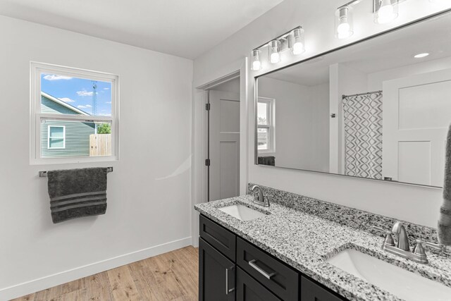35 Andy Ct, Clark, MO 65243 - bathroom with double vanity and wood finished floors