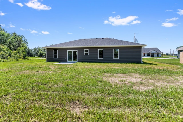 35 Andy Ct, Clark, MO 65243 - back of property with a patio and a yard