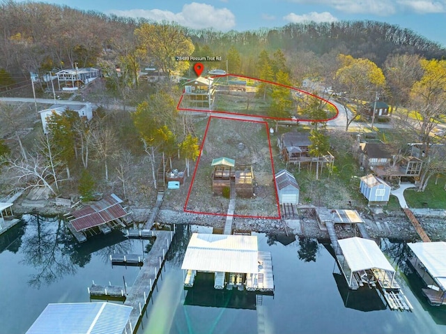 28489 Possum Trot Rd, Stover, MO 65078 - drone / aerial view featuring a water view and a wooded view