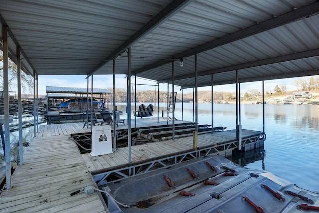 28489 Possum Trot Rd, Stover, MO 65078 - view of dock featuring boat lift and a water view