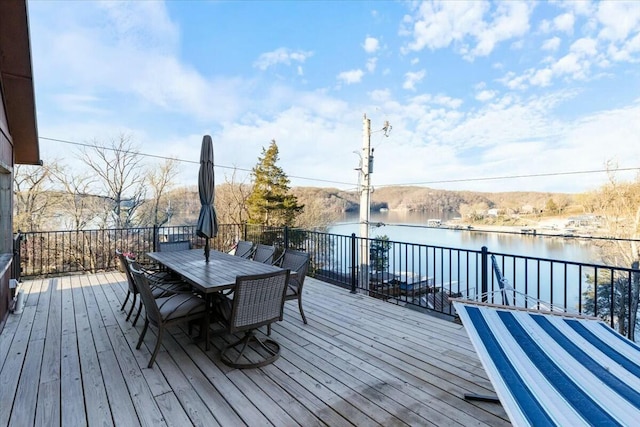 28489 Possum Trot Rd, Stover, MO 65078 - wooden deck featuring outdoor dining area and a water view