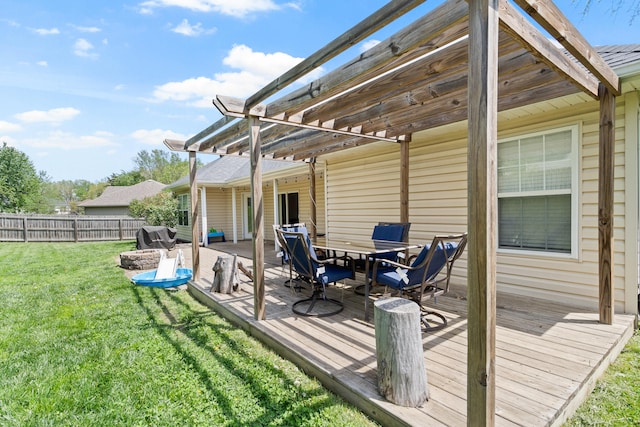 exterior space with a fenced backyard, outdoor dining space, a yard, and a deck