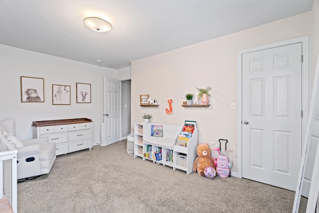 carpeted bedroom with baseboards