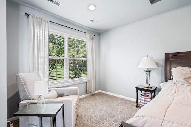 bedroom with visible vents, baseboards, and carpet floors