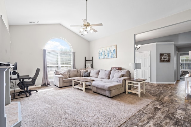 living room featuring vaulted ceiling, baseboards, a ceiling fan, and visible vents