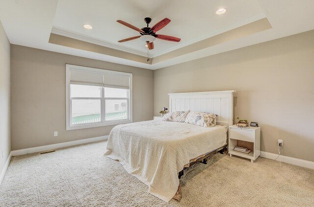 4716 Emeribrook Ct, Columbia, MO 65203 - bedroom featuring baseboards, a raised ceiling, ornamental molding, ceiling fan, and carpet flooring