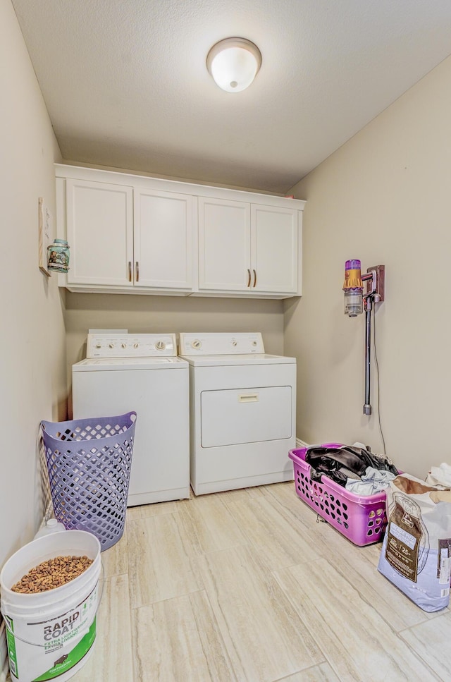 4716 Emeribrook Ct, Columbia, MO 65203 - clothes washing area featuring cabinet space, washing machine and dryer, and wood finished floors