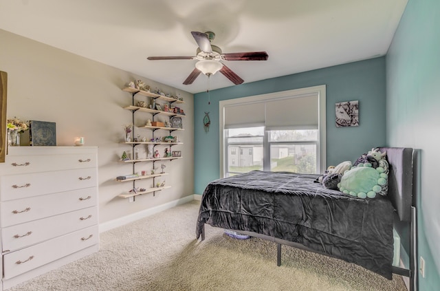4716 Emeribrook Ct, Columbia, MO 65203 - carpeted bedroom featuring baseboards and a ceiling fan