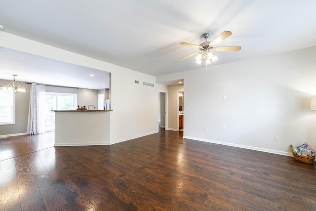 5003 Chesapeake Ln, Columbia, MO 65202 - unfurnished living room with ceiling fan, dark wood finished floors, and baseboards