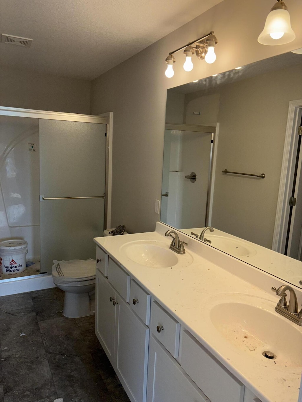 2312 Bitternut Ct, Columbia, MO 65201 - full bath with a stall shower, toilet, and double vanity