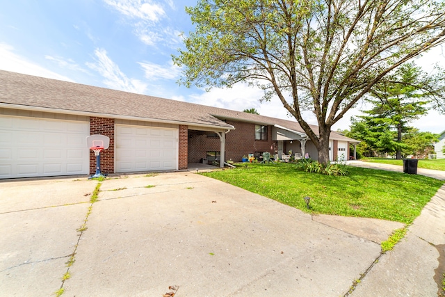 ranch-style home with a front lawn, an attached garage, brick siding, and concrete driveway