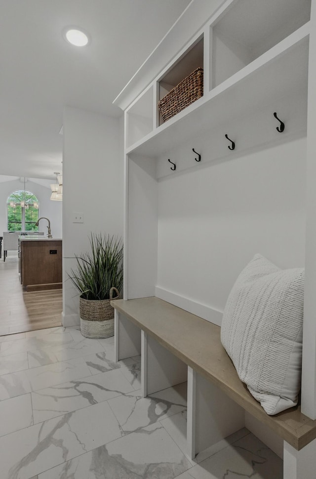 9747 S Rte N, Columbia, MO 65203 - mudroom with light marble finish floors and a chandelier