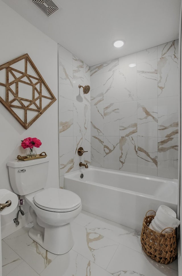 9747 S Rte N, Columbia, MO 65203 - bathroom with toilet, washtub / shower combination, marble look tile flooring, and recessed lighting