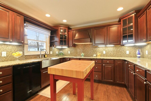 1204 S Walnut Ave, Salisbury, MO 65281 - kitchen featuring custom exhaust hood, dark wood-style flooring, a sink, dark brown cabinets, and black appliances
