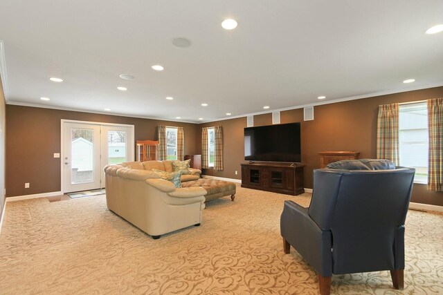 1204 S Walnut Ave, Salisbury, MO 65281 - living area with light carpet, baseboards, ornamental molding, and recessed lighting