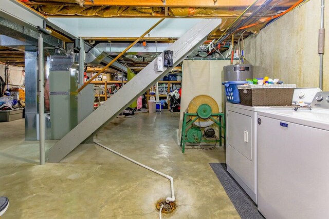 1204 S Walnut Ave, Salisbury, MO 65281 - unfinished basement with water heater and washer and clothes dryer