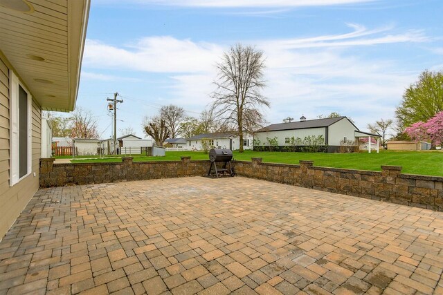 1204 S Walnut Ave, Salisbury, MO 65281 - view of patio featuring a grill and a residential view