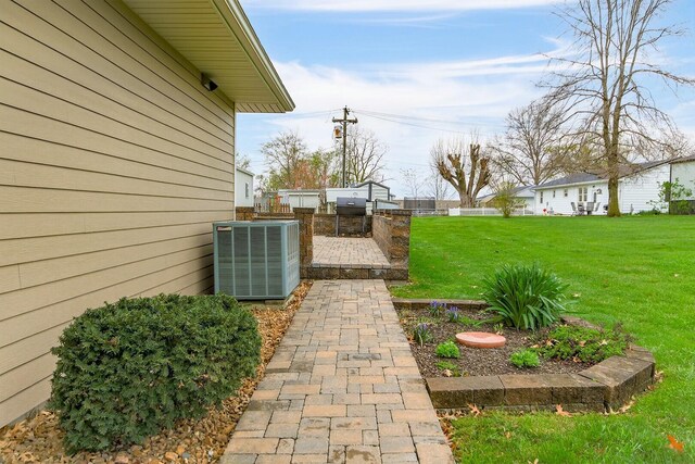 1204 S Walnut Ave, Salisbury, MO 65281 - view of yard featuring central air condition unit and fence