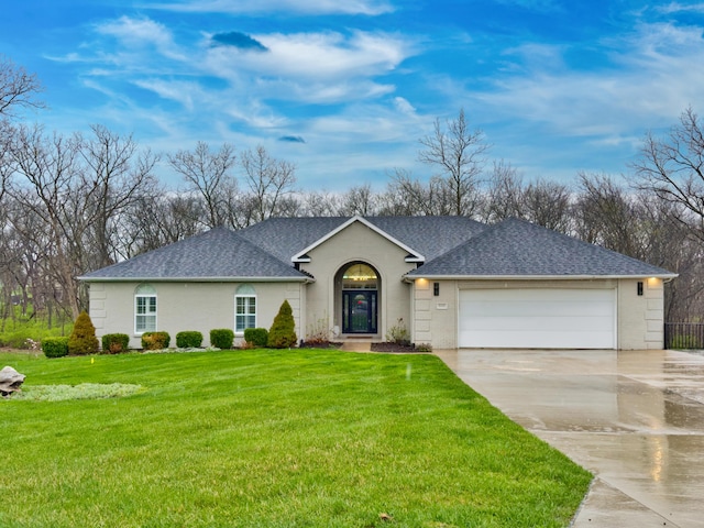 single story home with a shingled roof, an attached garage, driveway, and a front lawn