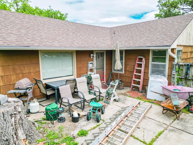 509 S Bus-54, Fulton, MO 65251 - rear view of property featuring a shingled roof and a patio