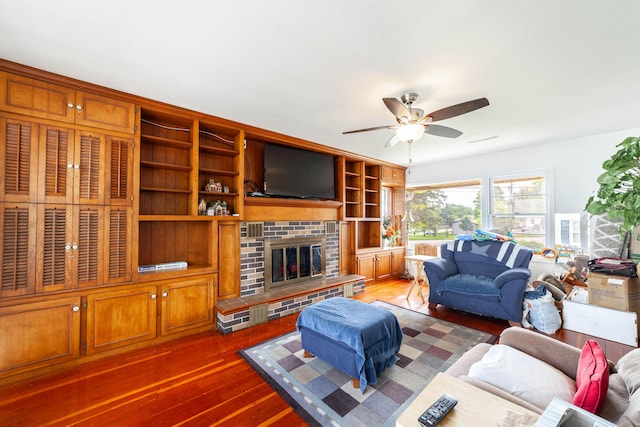 509 S Bus-54, Fulton, MO 65251 - living area featuring a fireplace, ceiling fan, and hardwood / wood-style flooring
