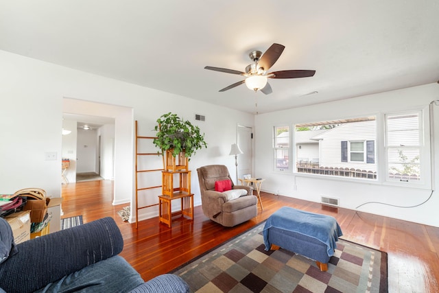 509 S Bus-54, Fulton, MO 65251 - living area with baseboards, a ceiling fan, visible vents, and wood finished floors