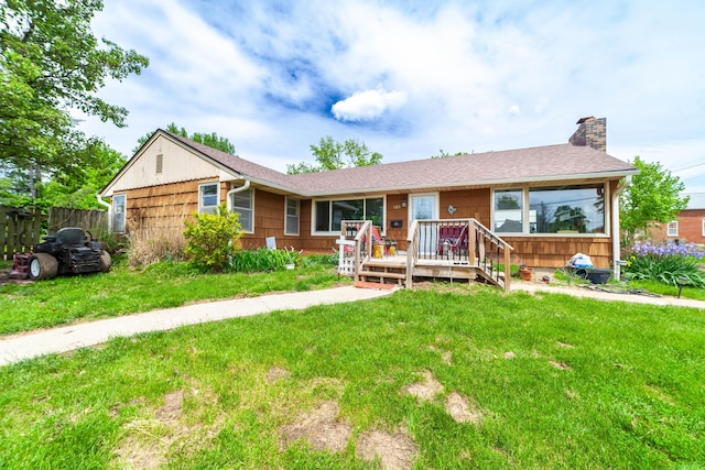 509 S Bus-54, Fulton, MO 65251 - ranch-style house featuring a chimney, a front lawn, and fence