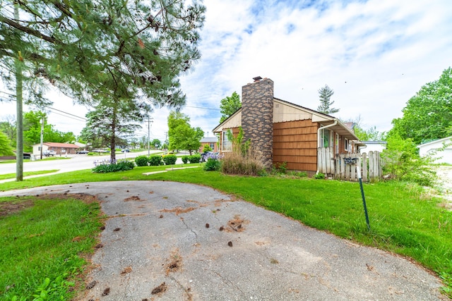 509 S Bus-54, Fulton, MO 65251 - view of side of property with a chimney and a yard