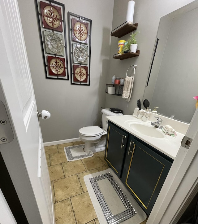4011 Spring Cress Dr, Columbia, MO 65202 - bathroom featuring vanity, toilet, and baseboards