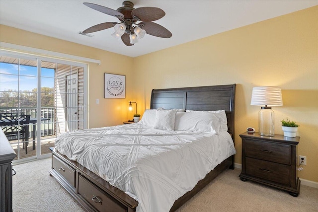 bedroom with baseboards, visible vents, light colored carpet, and access to exterior