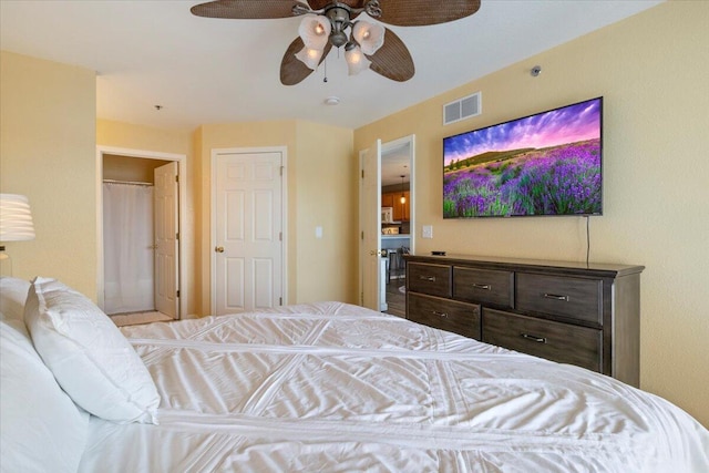 bedroom featuring visible vents and a ceiling fan